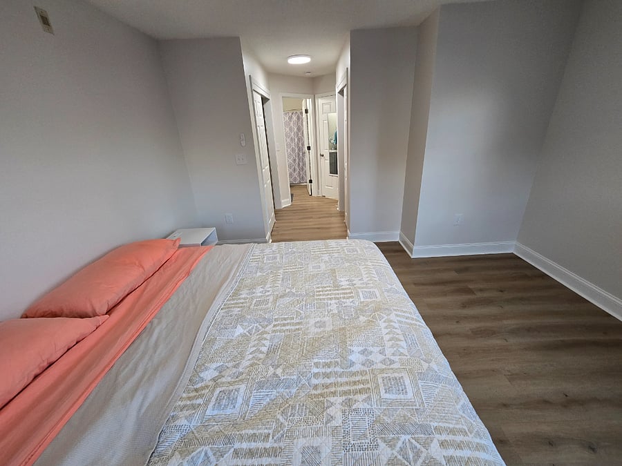 Master Bedroom (king size bed, 2 closets with drawers, standing desk, private master bathroom)