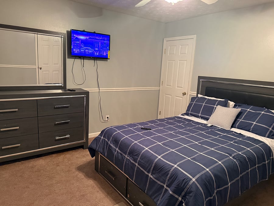 Bedroom #3 with Queen bed. Shares bathroom with bedroom #2. 