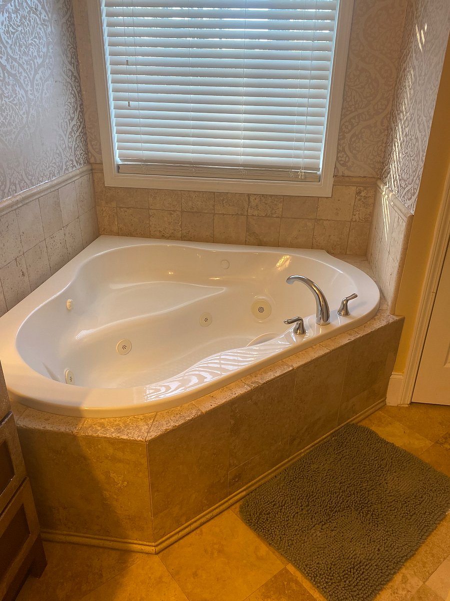Deep garden tub with jacuzzi jets
