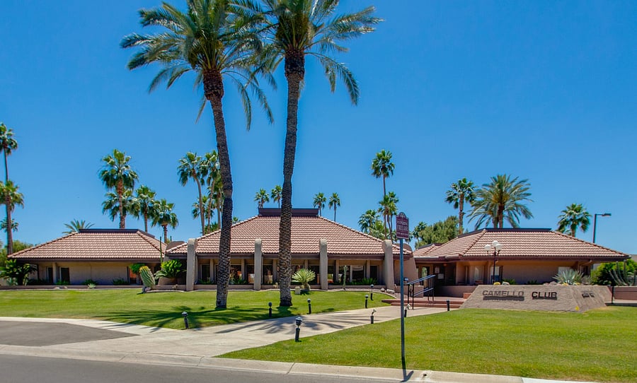Clubhouse with access to heated community pool, hot tub, and fitness equipment.