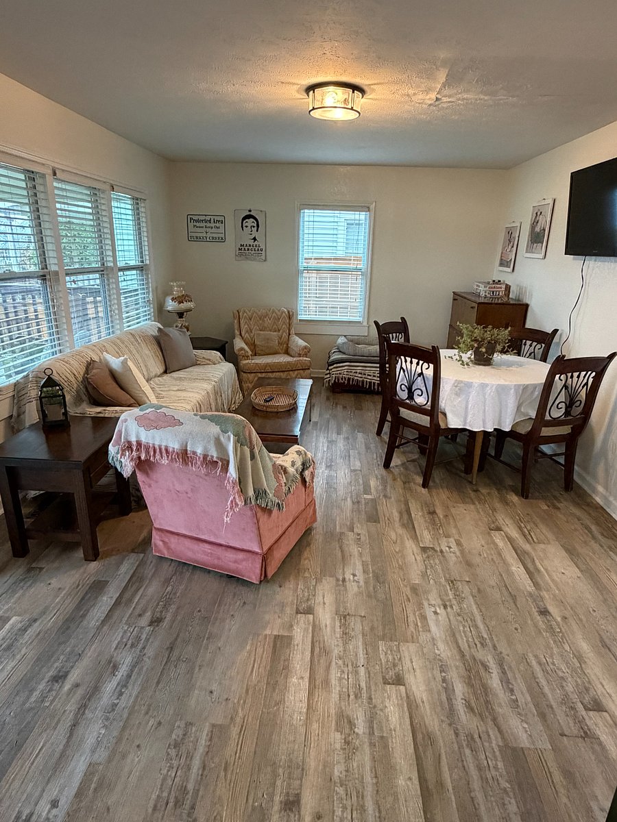 Living Room with Pull Out Couch, Smart TV + Roku, Dining Room Table & Chairs, & Dog Bed Available