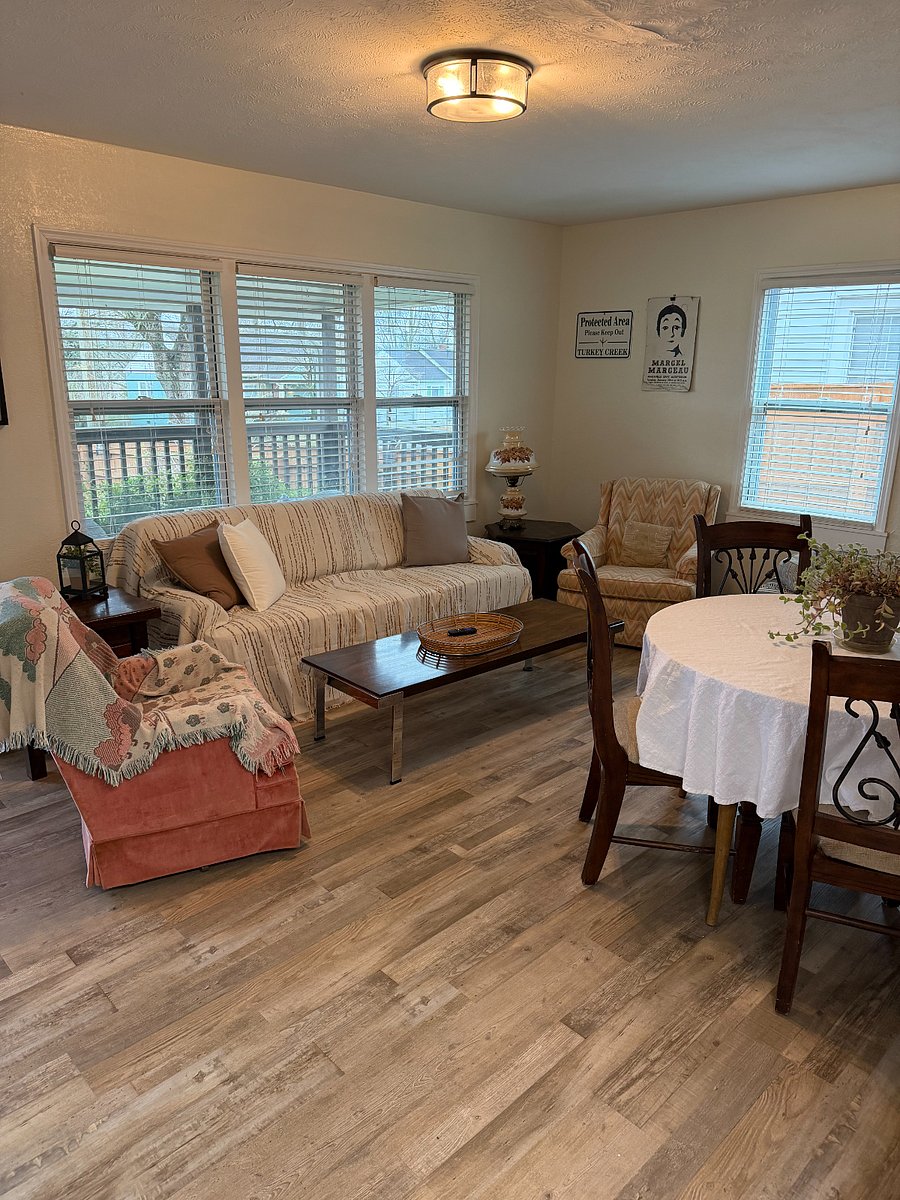 Living Room with Pull Out Couch, Smart TV + Roku, Dining Room Table & Chairs, & Dog Bed Available
