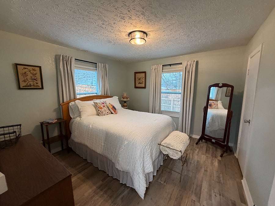 Primary Bedroom has Queen Sized Bed, Dresser, Full Length & Dresser Mirror, & Black-Out Curtains - TWO Closets