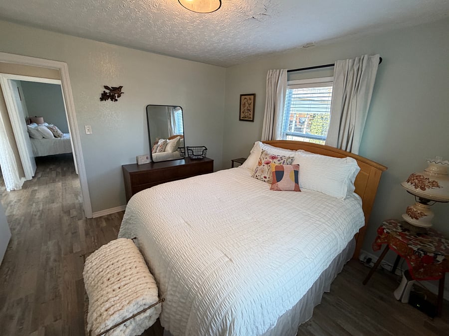 Primary Bedroom has Queen Sized Bed, Dresser, Full Length & Dresser Mirror, & Black-Out Curtains - TWO Closets
