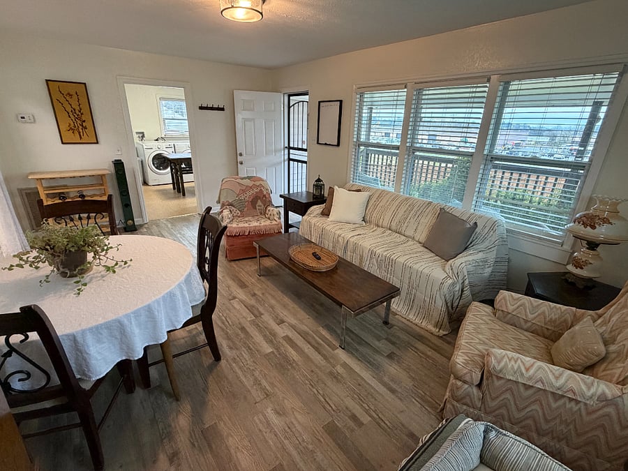 Living Room with Pull Out Couch, Smart TV + Roku, Dining Room Table & Chairs, & Dog Bed Available