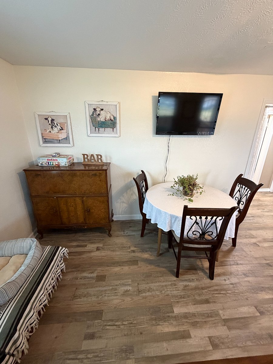 Living Room with Pull Out Couch, Smart TV + Roku, Dining Room Table & Chairs, & Dog Bed Available