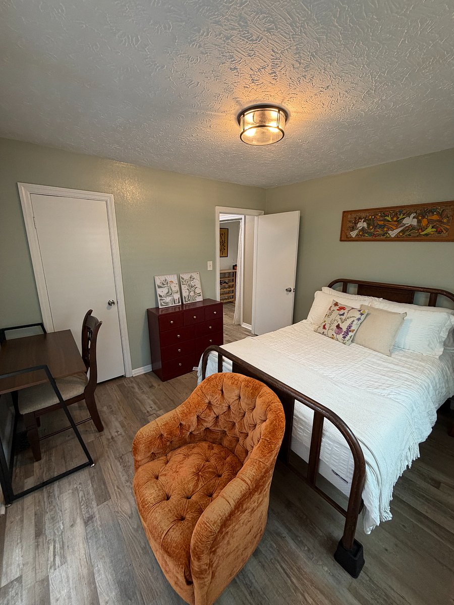 Second Bedroom has Full Sized Bed, Dresser, Desk (can be moved around the house or folded flat), and Door to Backyard (used as private entrance or can be locked) - One Closet