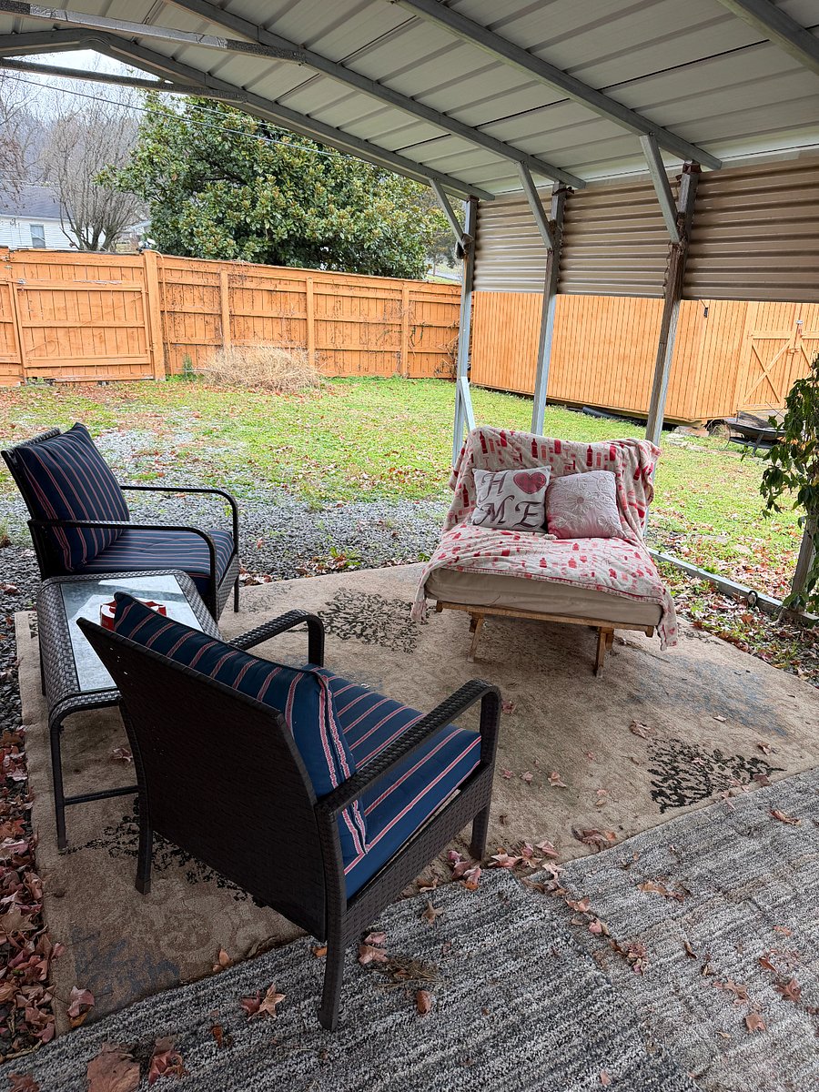 Optional covered hang space under the carport in the backyard.