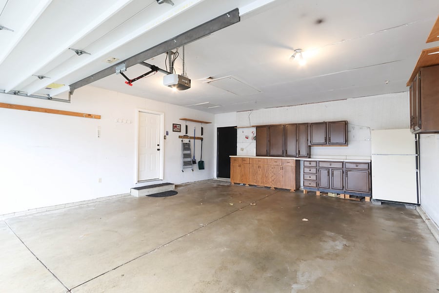 2 car garage with extra fridge.