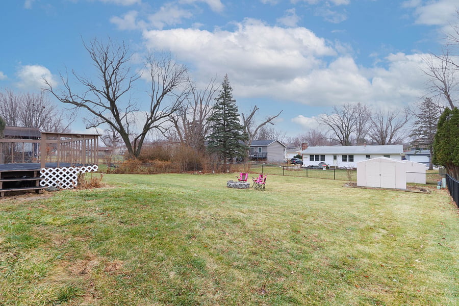 Fenced-in Backyard, deck, firepit.