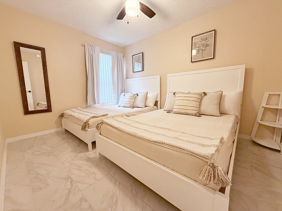Bedroom with 2 Full beds and walk-in closet