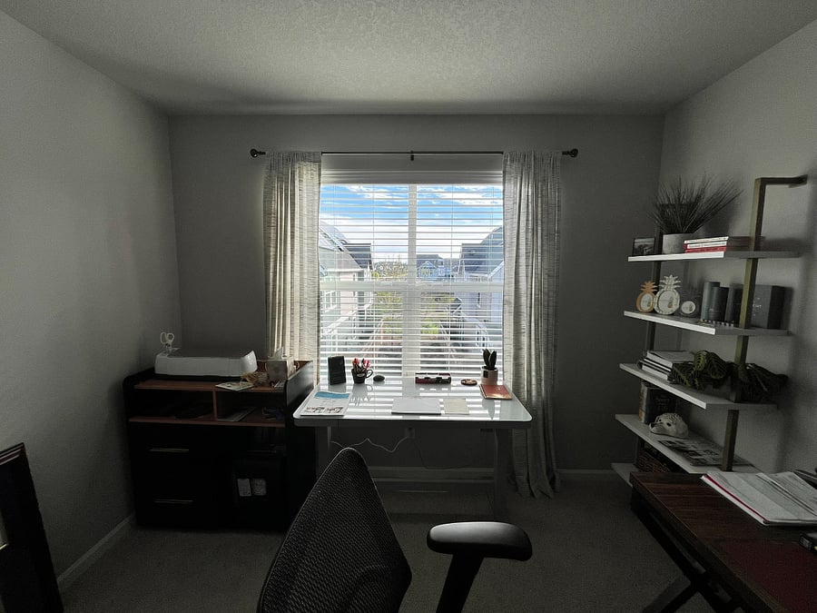 Shared office space, sit to stand desk.