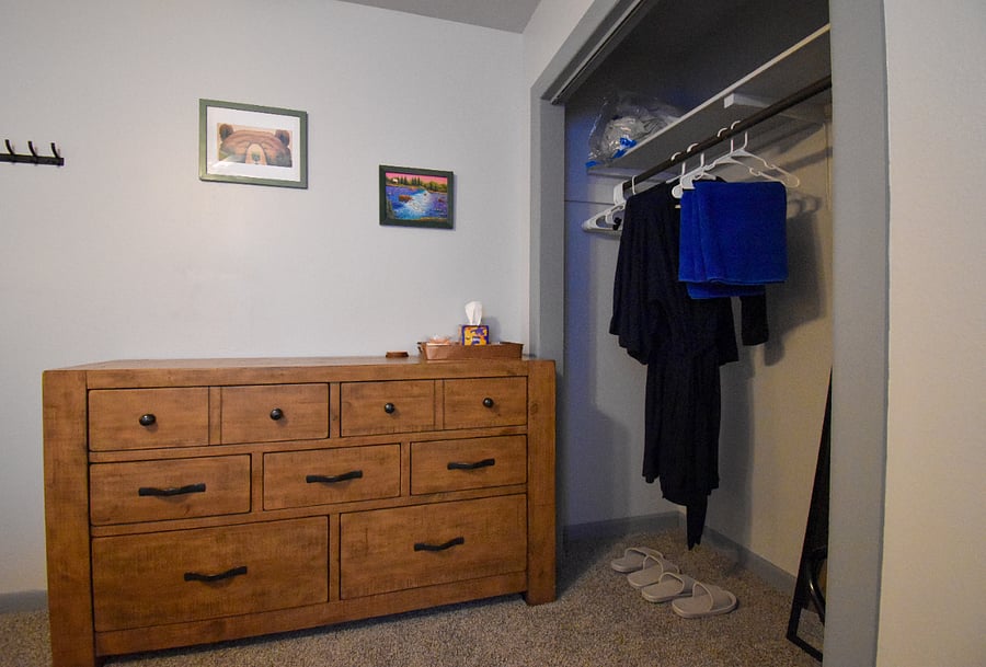 Local art and thoughtful touches make this space feel special. Youll find a full-length mirror, earplugs, a white noise machine, and cozy robes, towels, and slippers ready for the hot tub.
