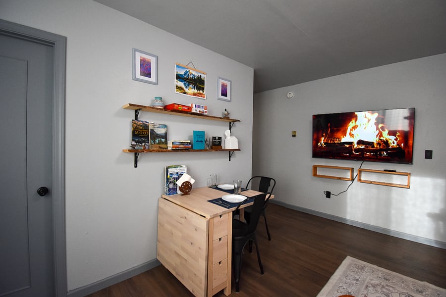 Kick back after a day of exploring Fairbanks. Stream your favorite shows on the TV (Netflix, Hulu, Prime included), or play a board game at the expandable dining table. Cozy seating, local art, and little touches make this space feel like home.