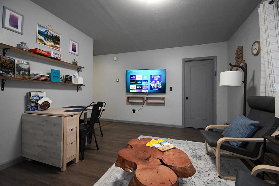 Enjoy a meal or game night at the expandable dining table, stocked with puzzles, board games, and books.