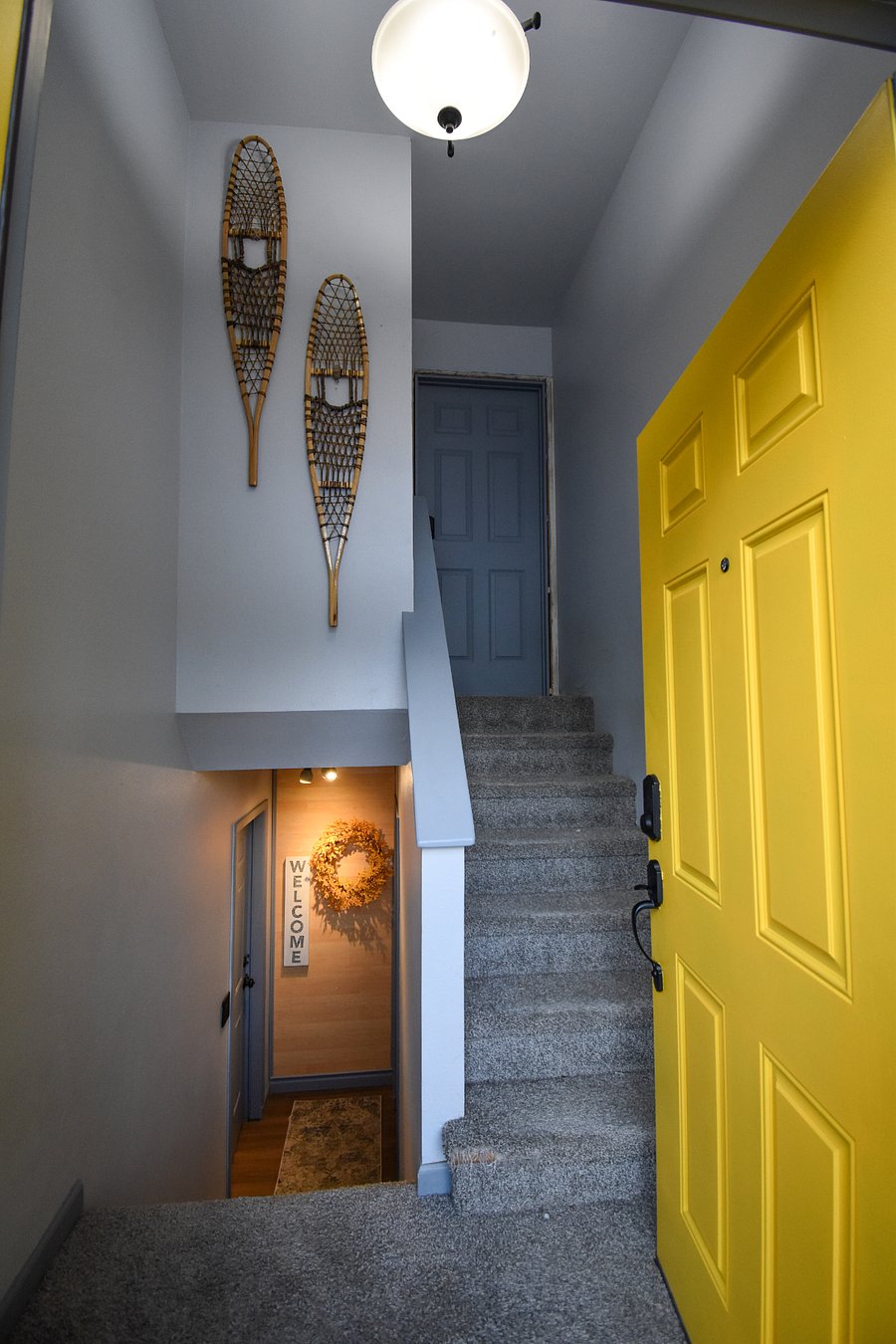 Enter easily with the keyless lock, then head down a short staircase to the cozy ground-floor unit.