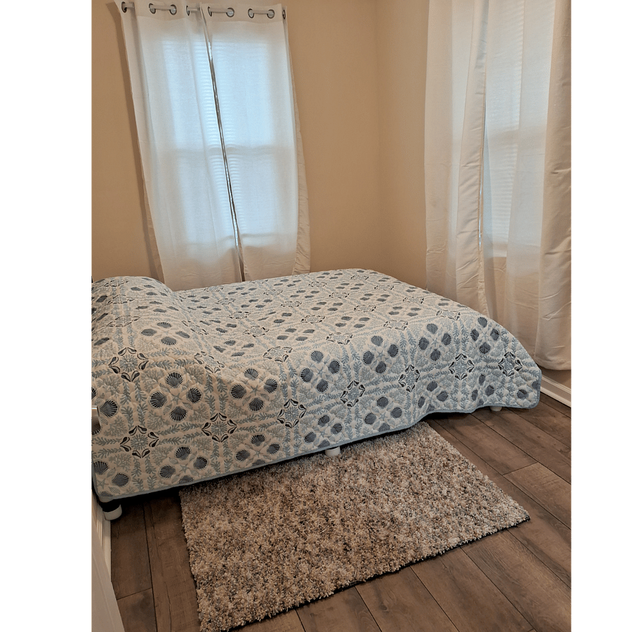 Bedroom #3. Full bed. Across hall from bathroom.