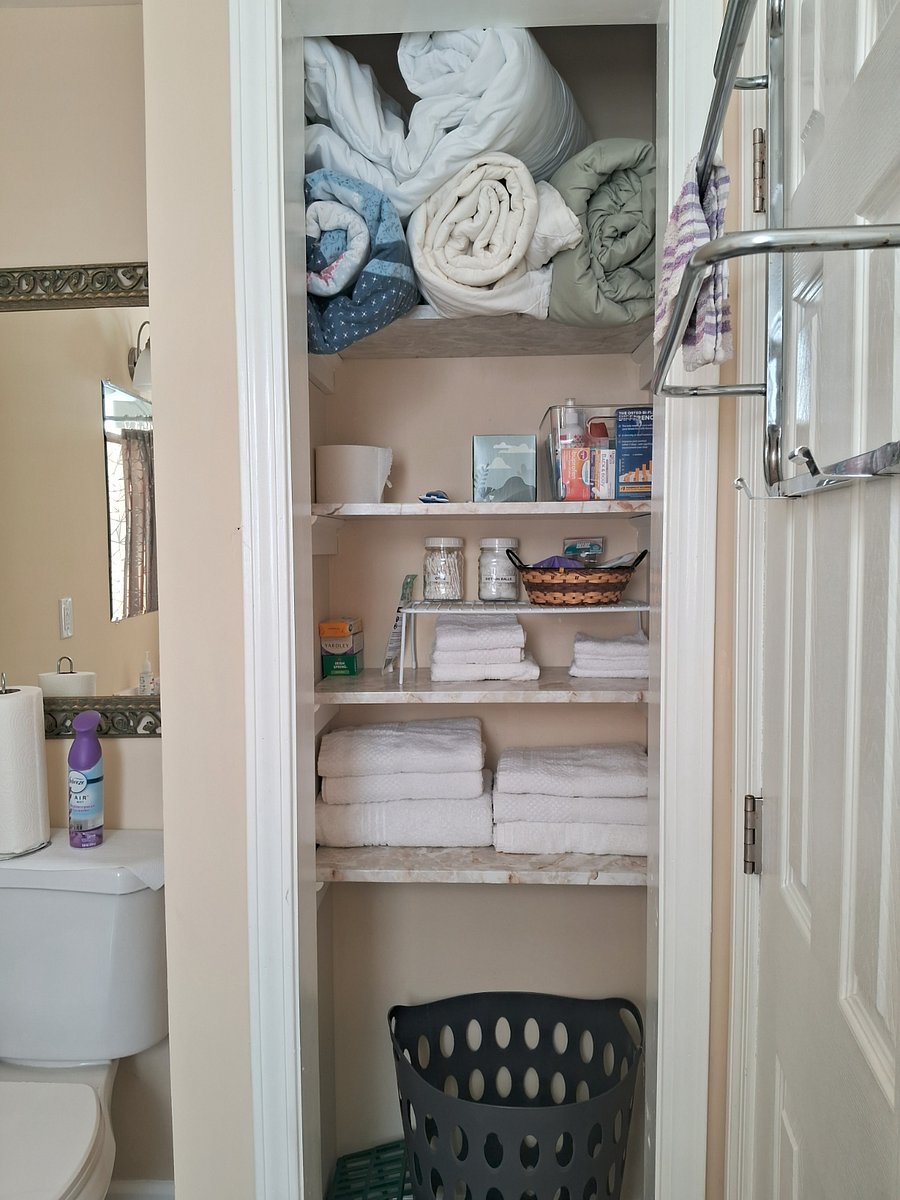 Bathroom linen closet, basic hygiene supplies provided
