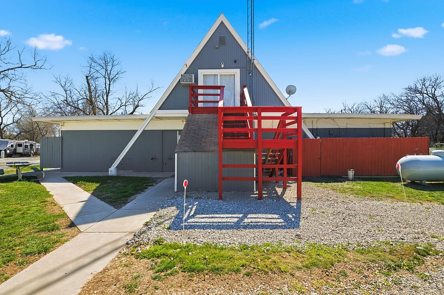 Private back entrance with designated parking space