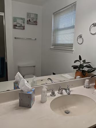 2nd floor bathroom with storage space, leading in from the 2nd floor bedroom.