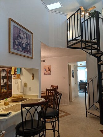 Entry way to the living room, dining room, galley kitchen.
