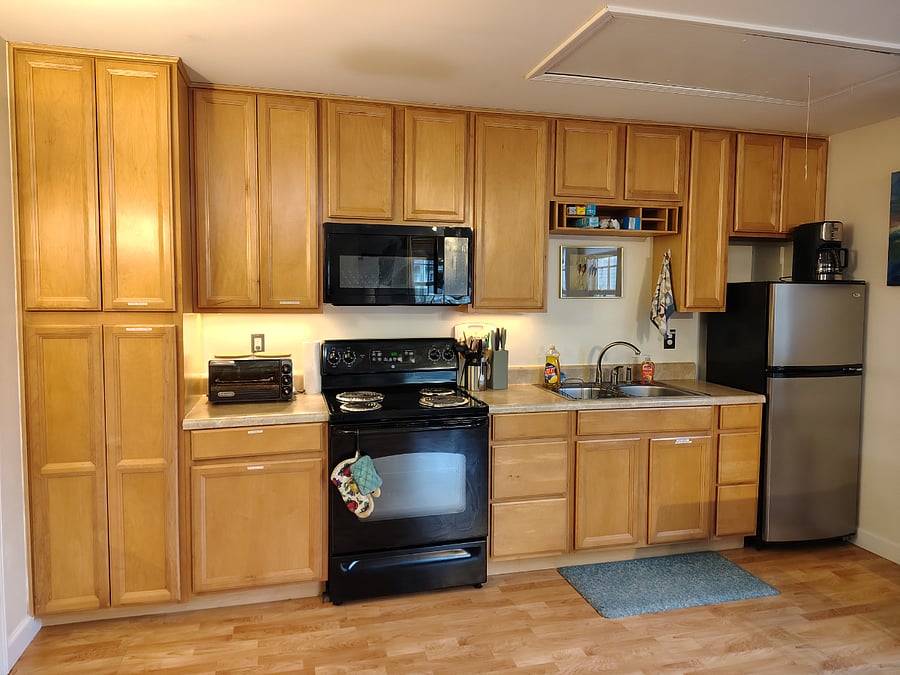 full kitchen with so much cabinet space