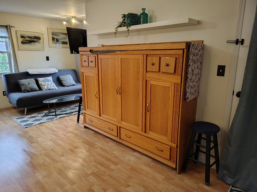 full sized murphy bed is just as comfortable as a normal bed, but tucks away when not needed