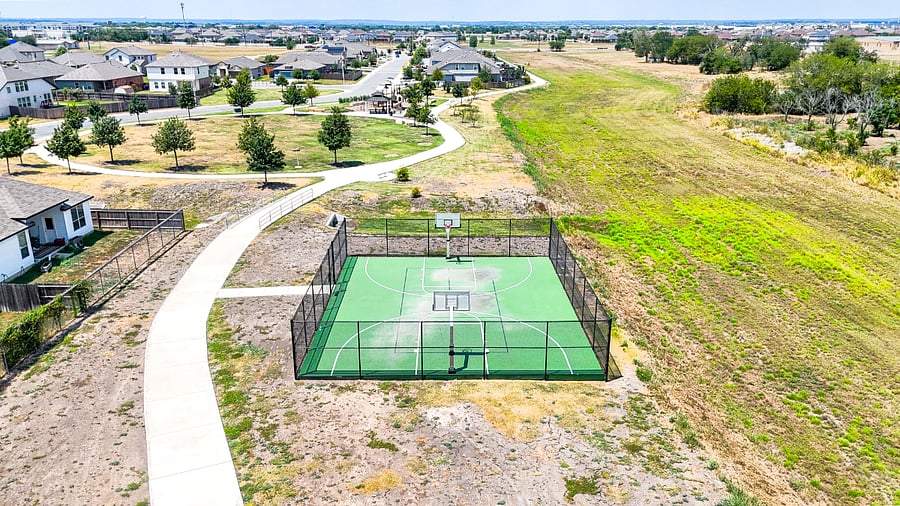 Basketball court located along the walking trailsgreat for families or anyone who enjoys staying active.