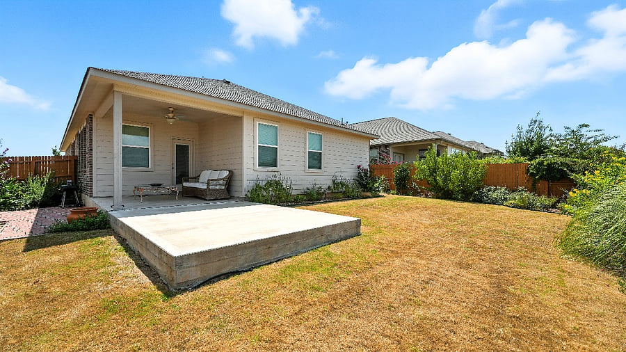 The fully fenced backyard offers space to breathe, relax, and enjoy a little outdoor timegreat for pets, kids, or just soaking up the Texas sunshine.