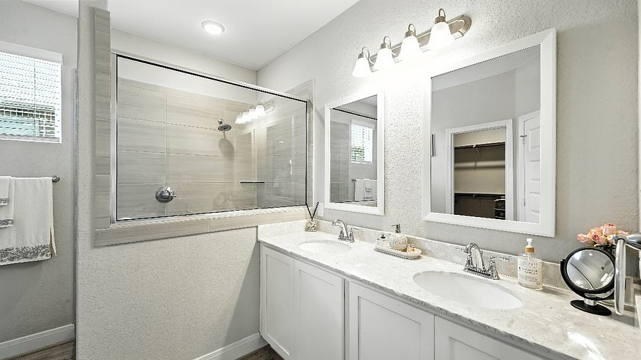 Walk-in shower in the primary ensuite, offering a fresh, spa-like feel.