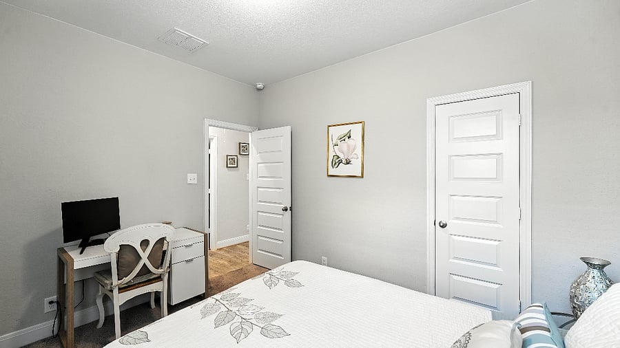 Bedroom workspace with desk and chairperfect for remote work, studying, or a quiet place to focus.