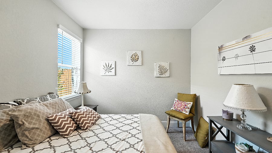 Third bedroom with a full bed, offering flexible sleeping arrangements or bonus room space.