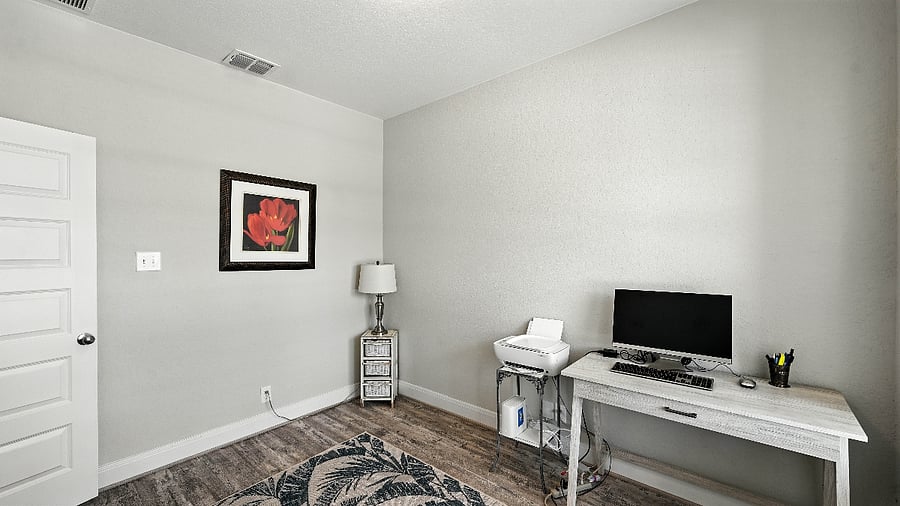 Private flex room set up as a home office, ideal for remote workers or anyone needing a quiet space.