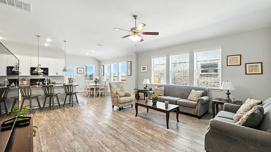 Open-concept living, dining, and kitchen area made for easy living, good conversations, and everyday comfort.
