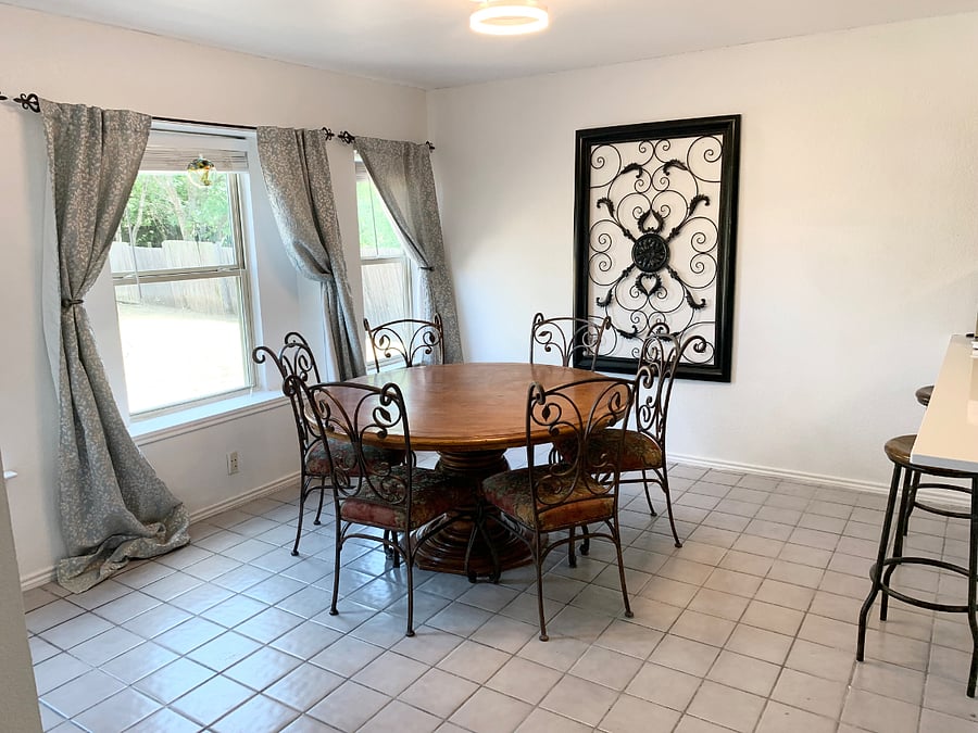 Wood kitchen table that seats 6 with kitchen bar seating for 2