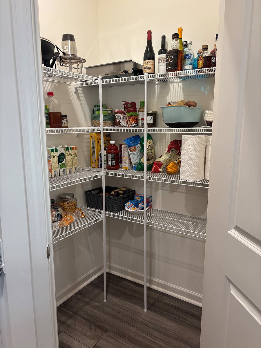 Spacious pantry. Kitchen has a walk-in pantry with plenty of storage and ample cookware for your use