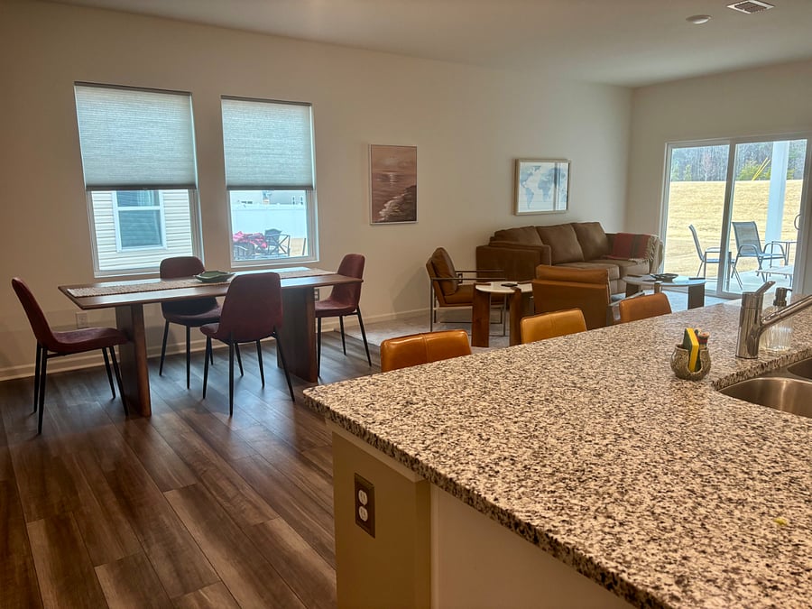 Dining & living area with a spacious open floor concept.