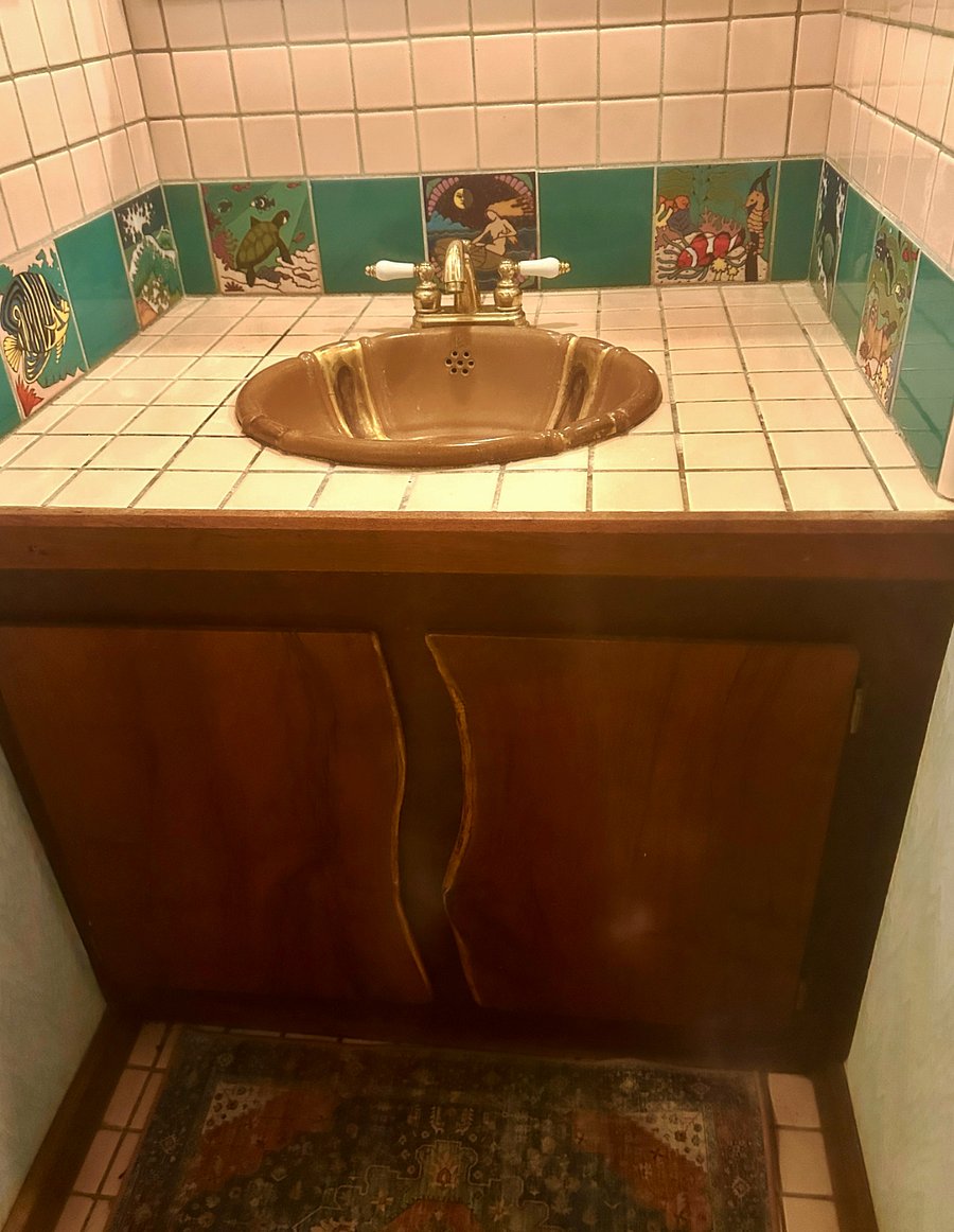 artist signed sink and hand painted tiles