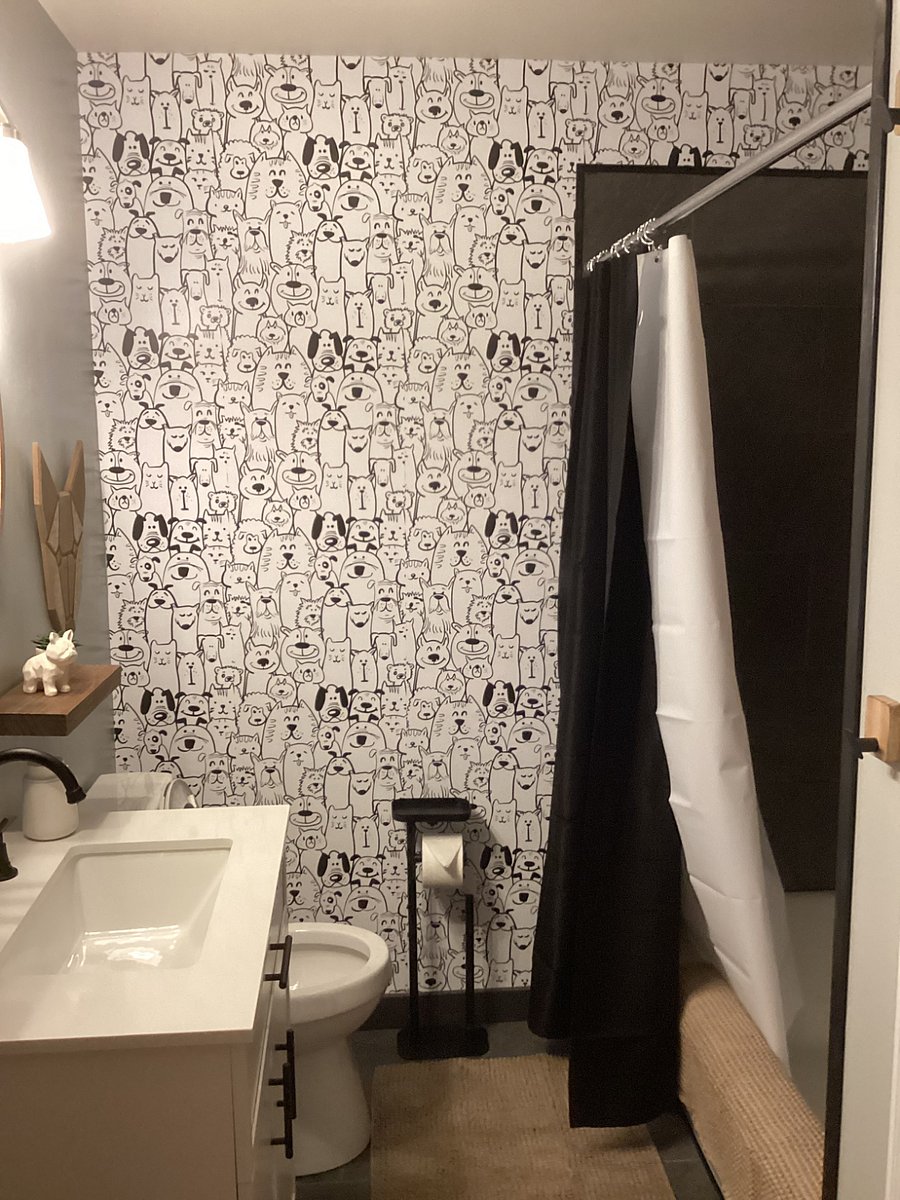 Full Bathroom with Furry Friends on the wall to keep you company.