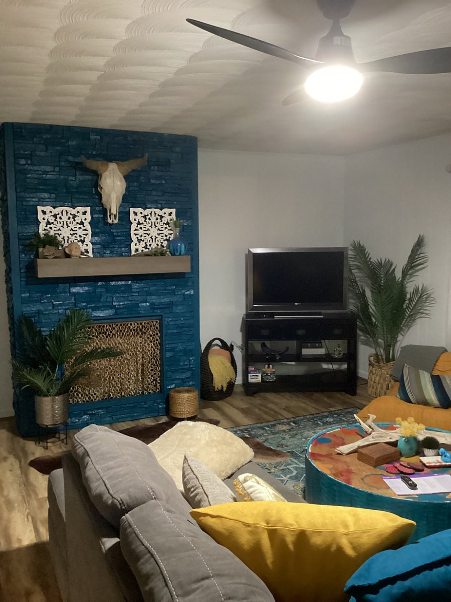 Spacious Boho Living Room with lots of comfort and storage.