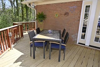 Outdoor dining or workspace on the top tier of the back deck