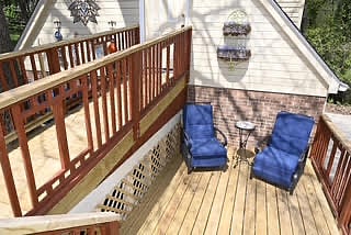 Lower tier seating and nature views on the back deck