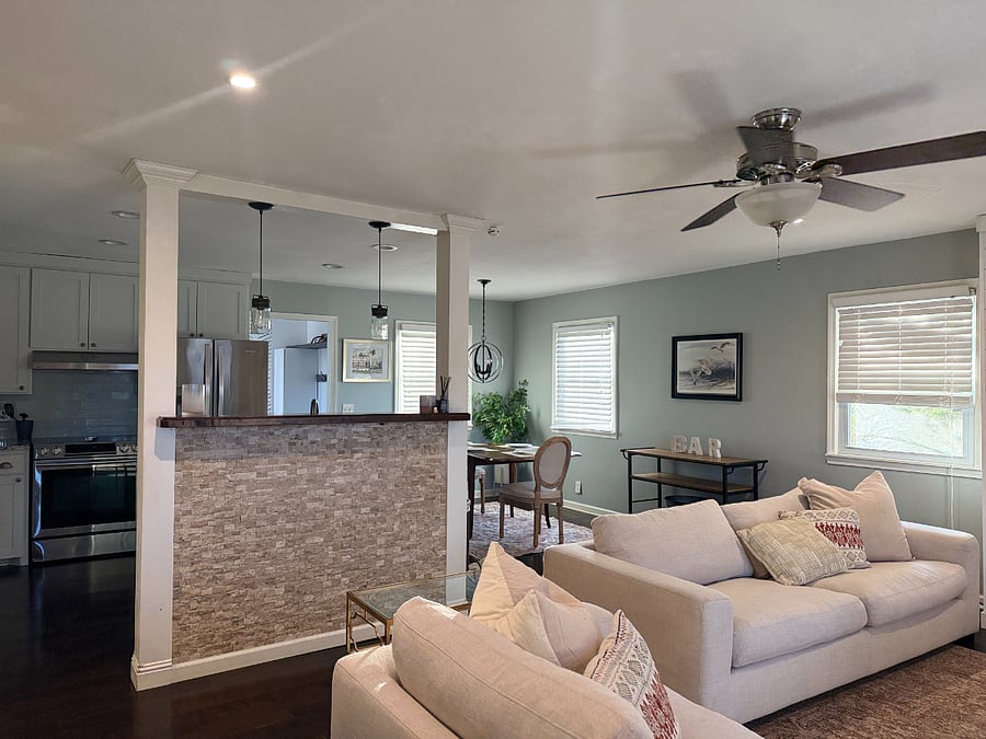 Open floor place from living room to kitchen and dining space