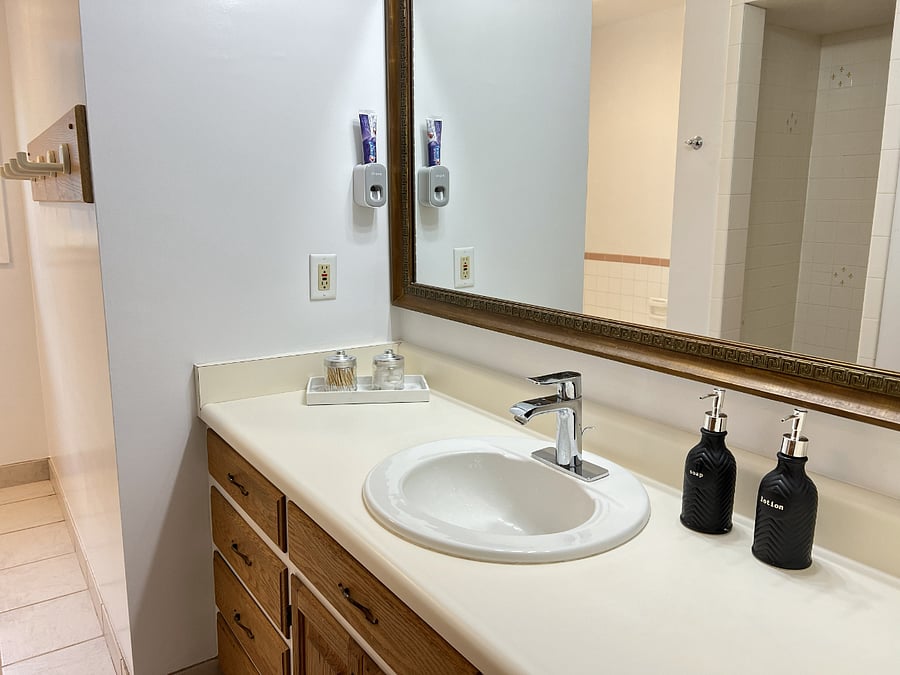 Bathroom sink and mirror.