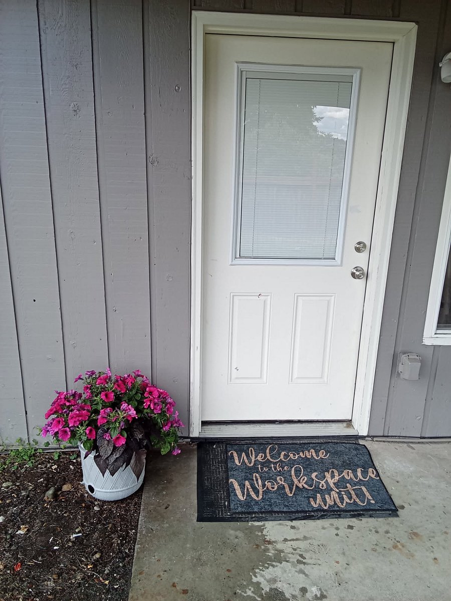 Private entryway separate from the house. Enter down the side driveway through the gate into the unit.
