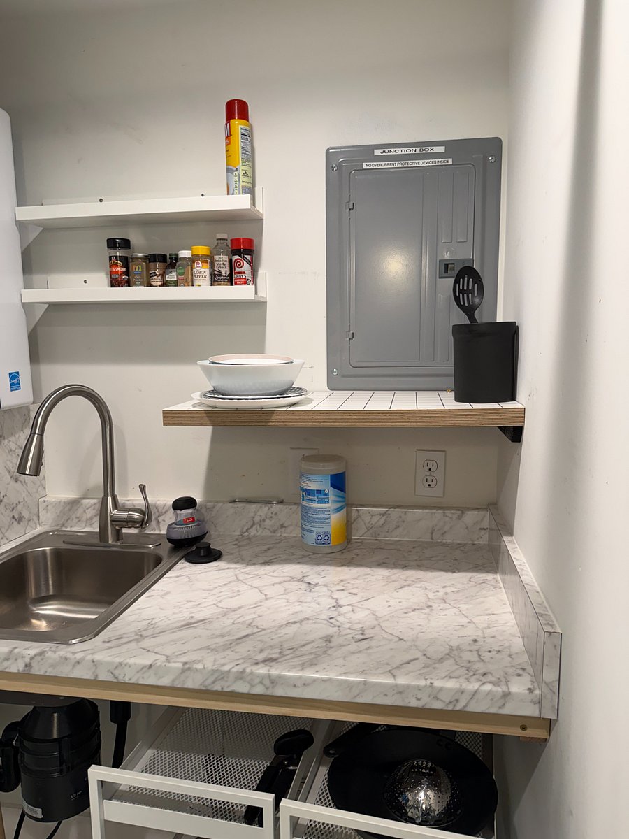 Kitchen with pots, pans. silverware. Will complete once I have a renter. Sink has a sink with a garbage disposal.