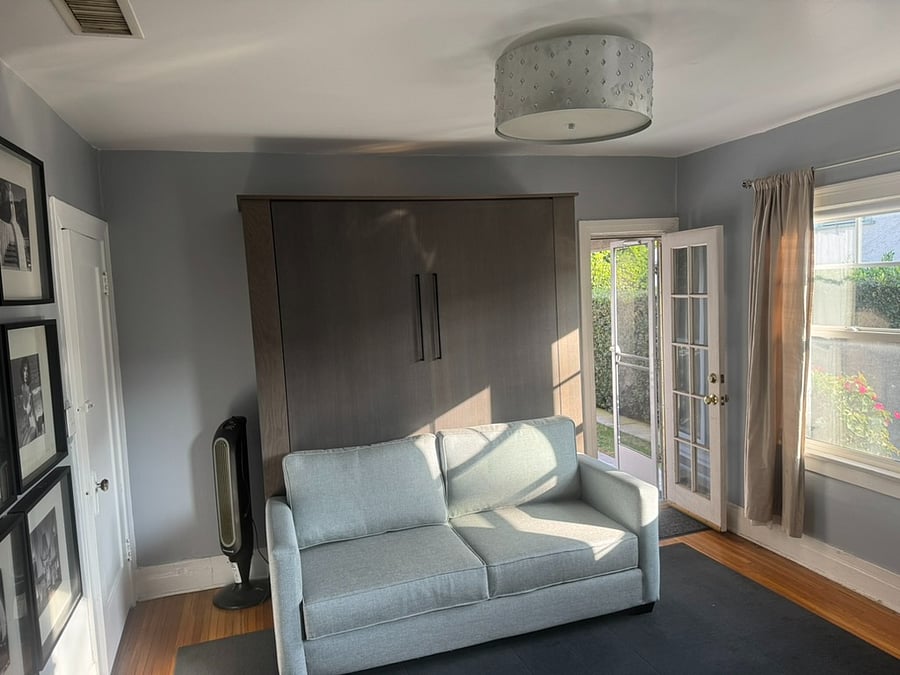 queen sized murphy bed that turns into a couch-shown here