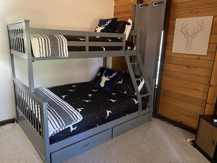 Upstairs loft with twin over full sized bed bunk