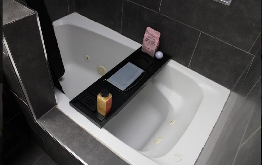 Jetted tub shower