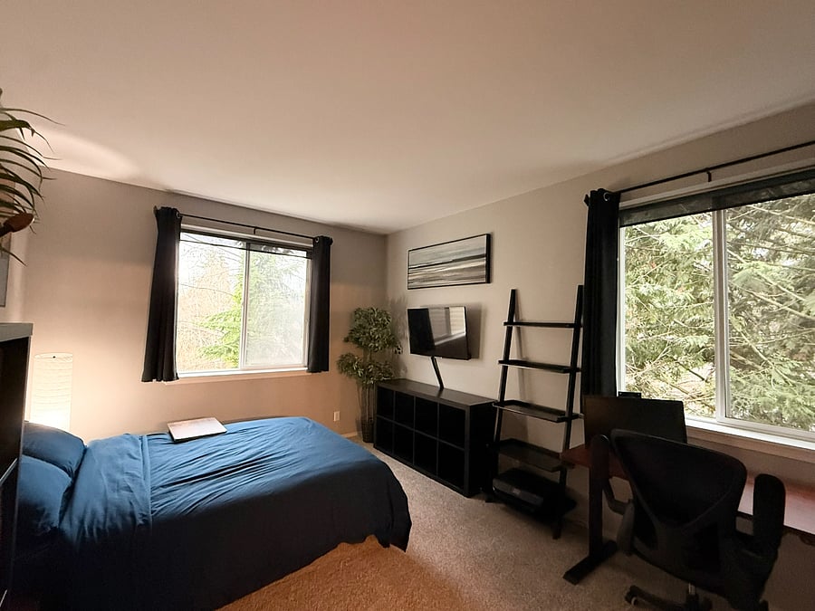Primary Bedroom with 40" TV to wind down and/or Sit/Stand Desk for productivity